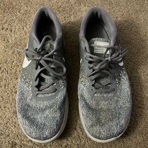 Grey Nike Flex Contact shoes